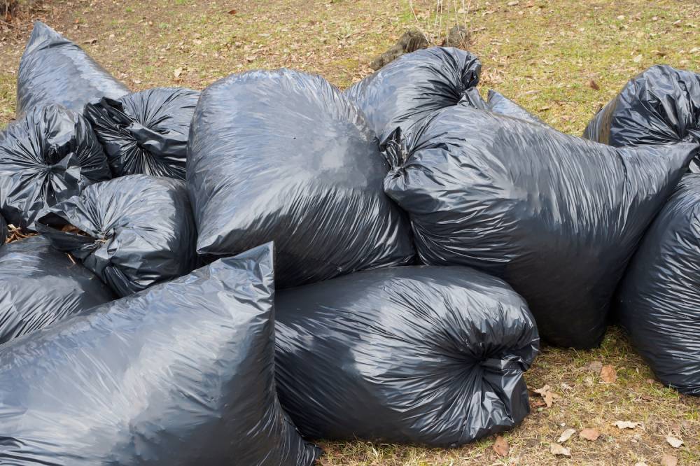 black rubbish bags in a pile
