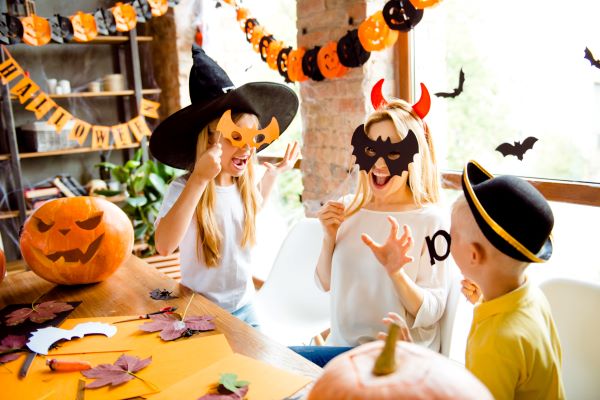 family with handmade costumes and decorations