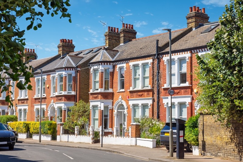 row of London houses sun shining